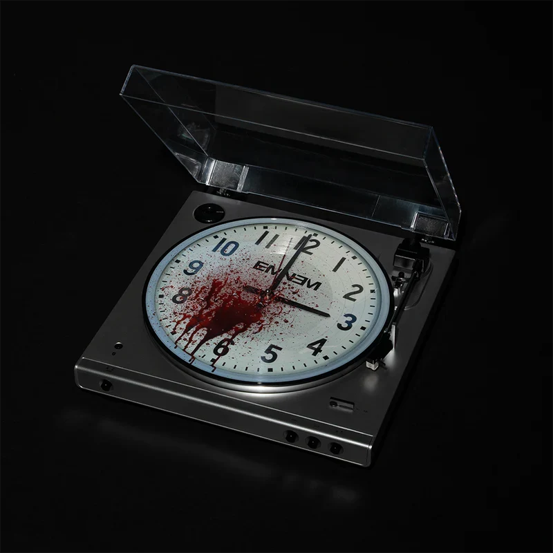 Angled view of Eminem 3 AM picture disc spinning on a silver turntable, blood-spattered clock design