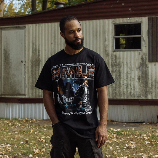 Man wearing the black Eminem 8 Mile Vintage 20th Anniversary T-shirt with full-colour film artwork
