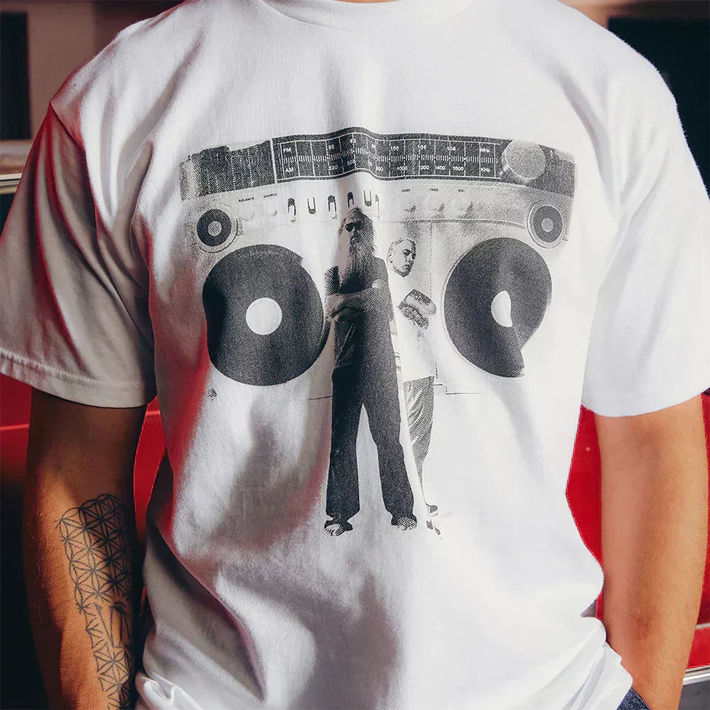 Close-up of the white Eminem Berzerk T-shirt print, boombox and figure in black and white