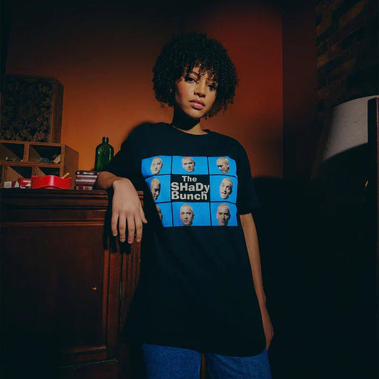 Woman wearing the black Eminem SSLP25 Shady Bunch T-shirt with photo grid graphic