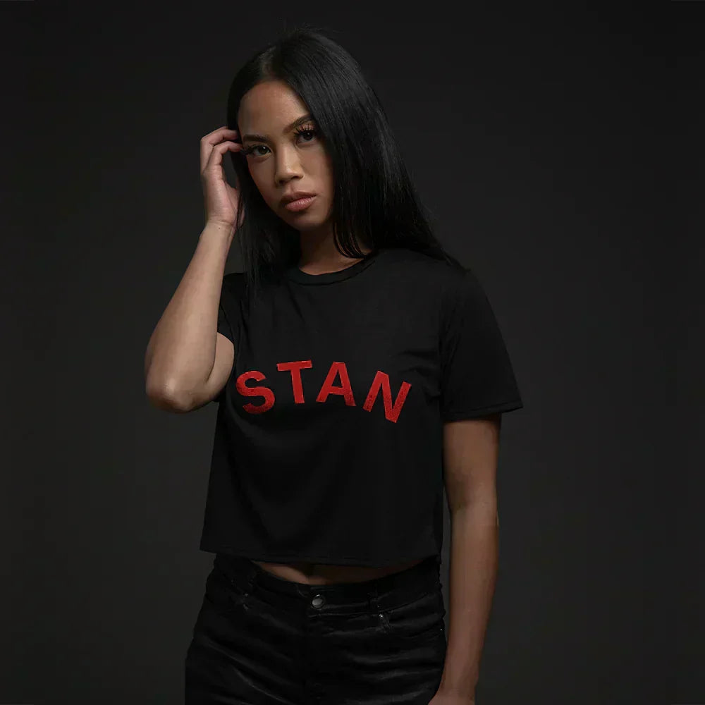 Woman wearing the black Eminem Stan cropped T-shirt with red graffiti lettering