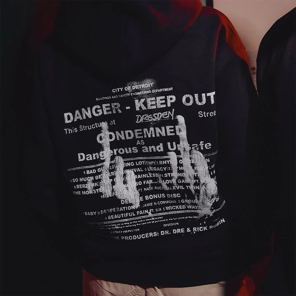 Back print detail reading Danger Keep Out Condemned on the Eminem MMLP2 hoodie