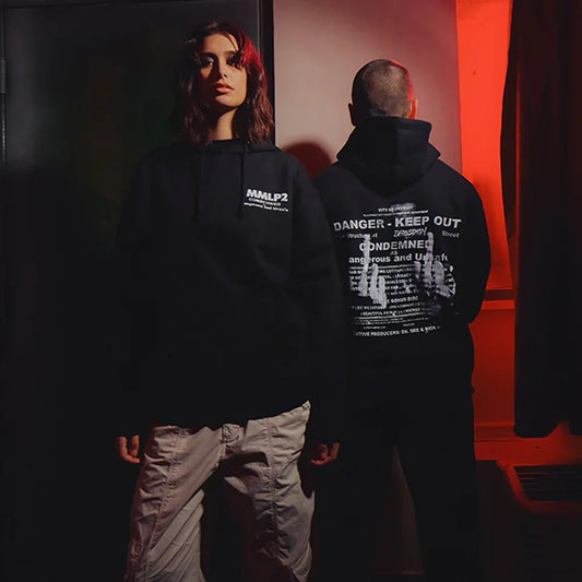 Two models in black Eminem MMLP2 Condemned hoodies with Danger Keep Out back print