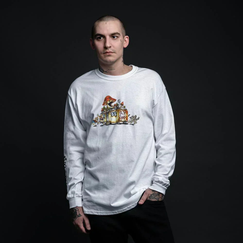 Man wearing the white Eminem SSLP Illustrations long sleeve with cartoon chest graphic