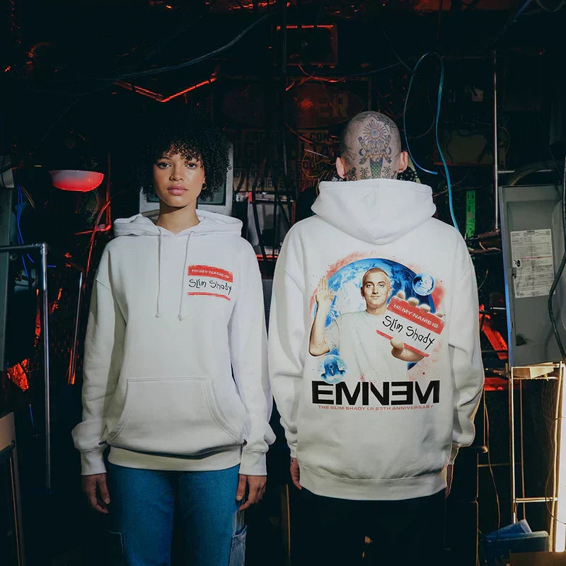 Two models in white Eminem SSLP25 Name Tag hoodies with red name tag and back art